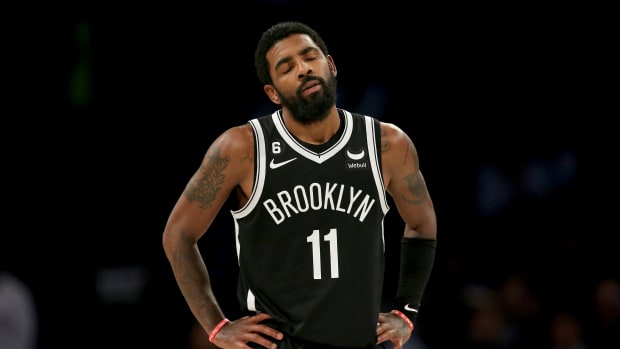 Kyrie Irving sighs after a foul call.